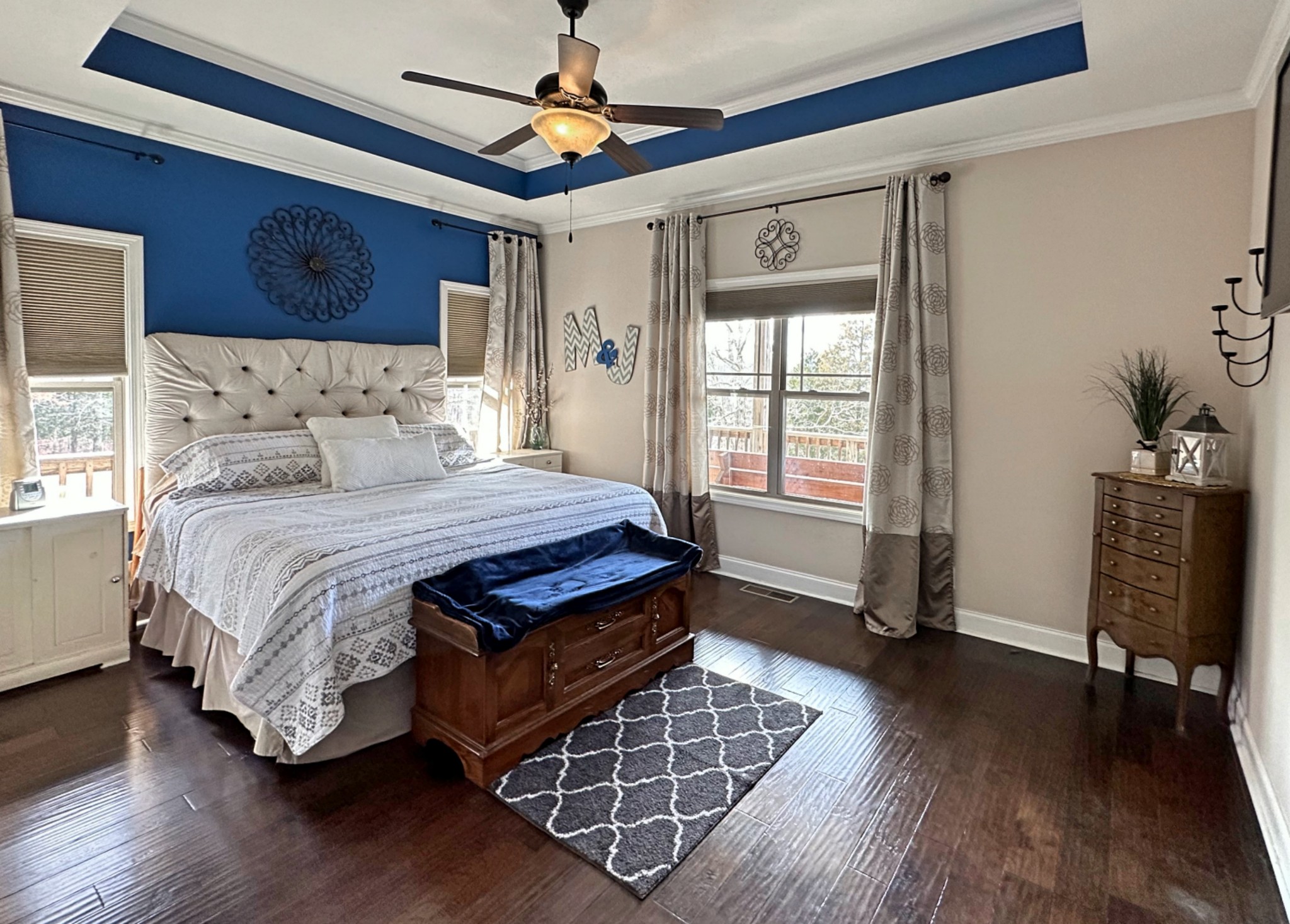 1815 Broome Road Palmyra, TN 37142 - Photo 24 of 61 a bedroom with a bed and wooden floor