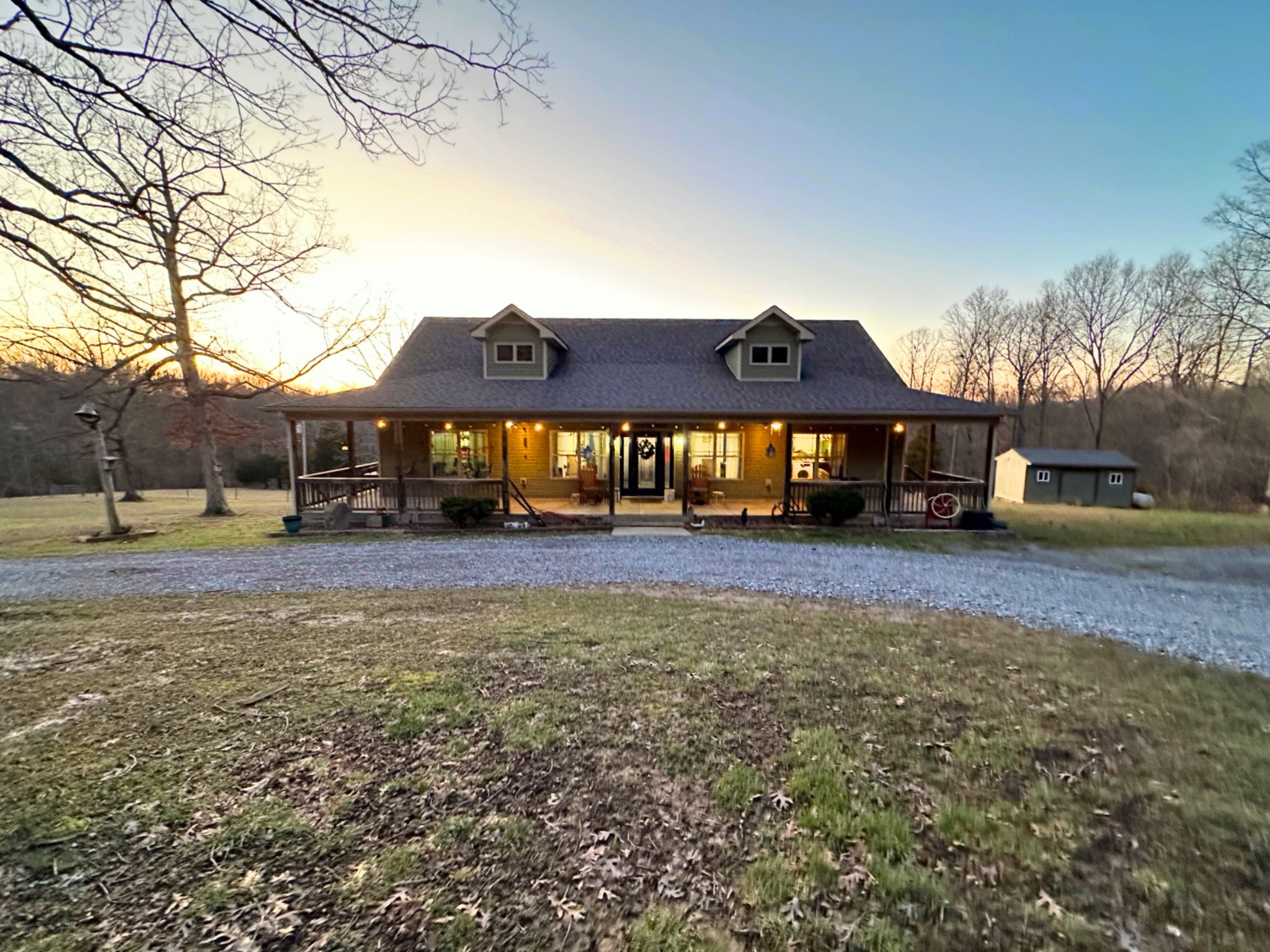 1815 Broome Road Palmyra, TN 37142 - Photo 3 of 61 a front view of a house with a yard