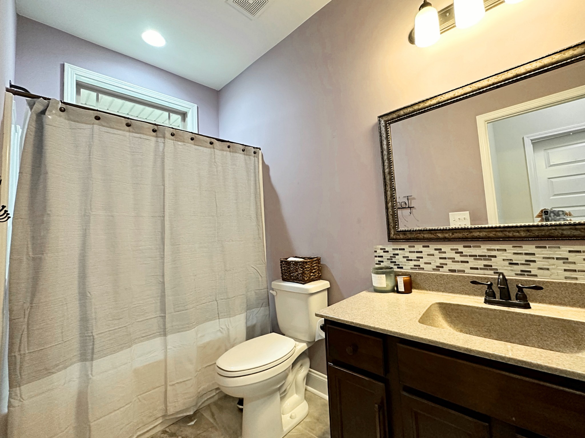 1815 Broome Road Palmyra, TN 37142 - Photo 31 of 61 a bathroom with a sink toilet and shower