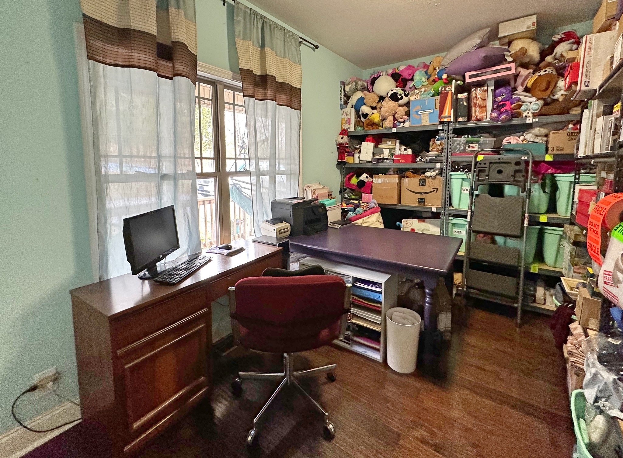 1815 Broome Road Palmyra, TN 37142 - Photo 32 of 61 a view of a workspace with furniture and a window