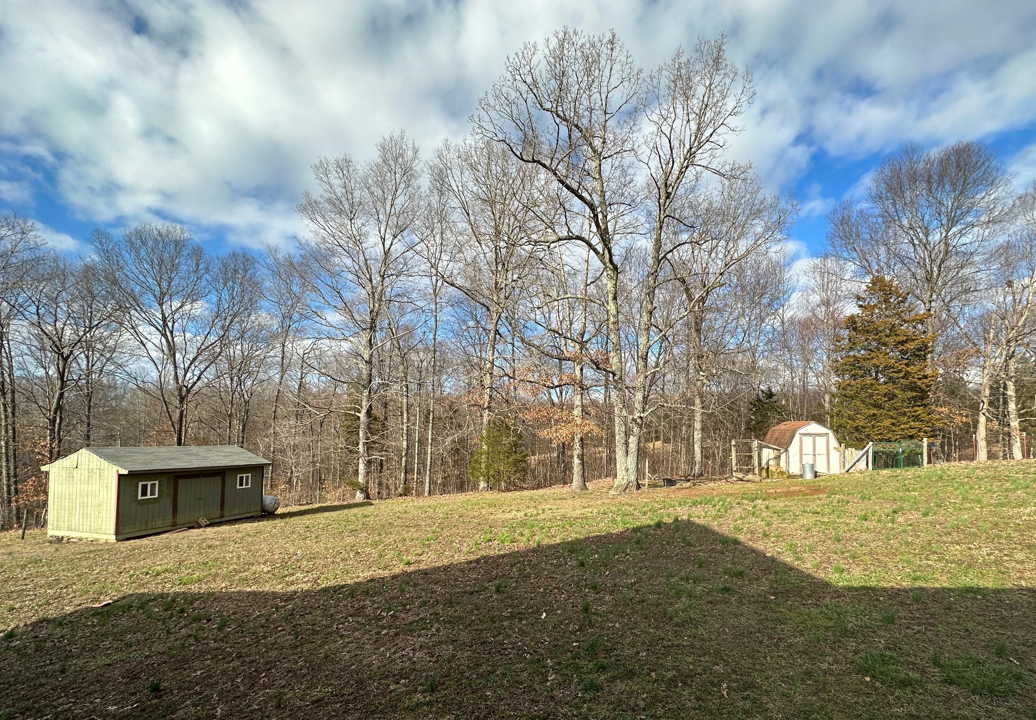 1815 Broome Road Palmyra, TN 37142 - Photo 48 of 61 a front view of a house with a yard
