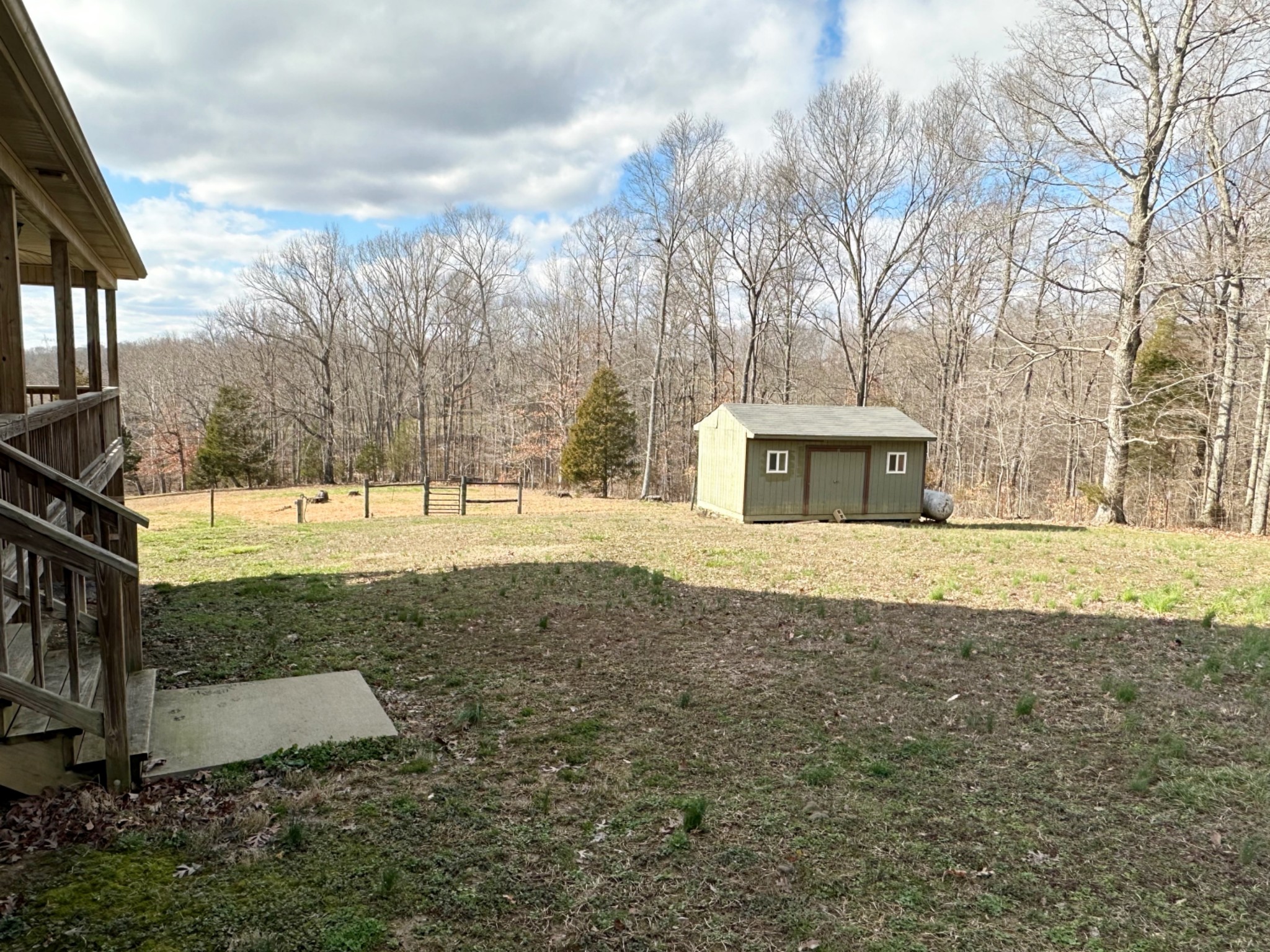 1815 Broome Road Palmyra, TN 37142 - Photo 49 of 61 a view of yard with tree and a wooden fence