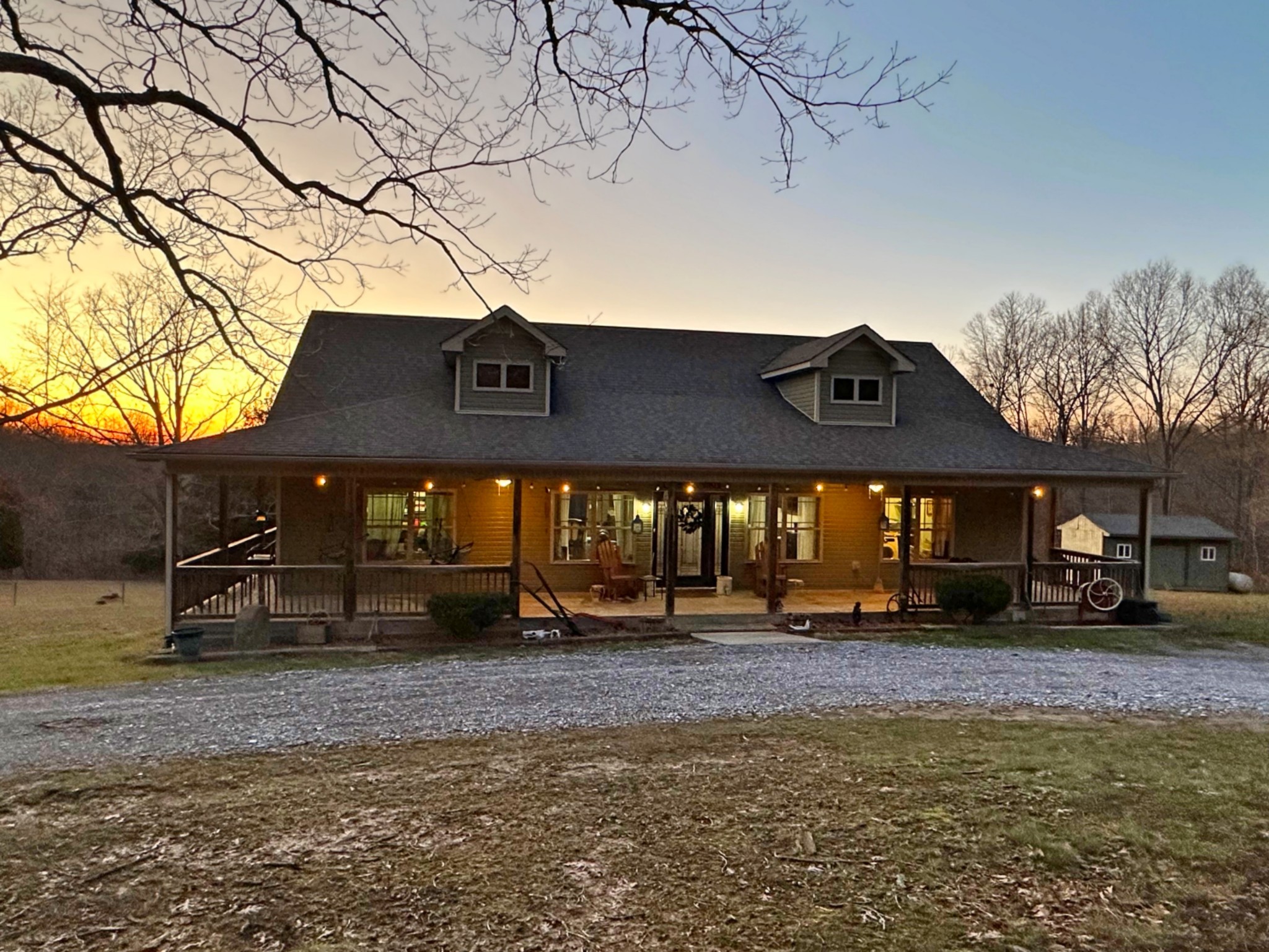 1815 Broome Road Palmyra, TN 37142 - Photo 5 of 61 a front view of a house with a yard