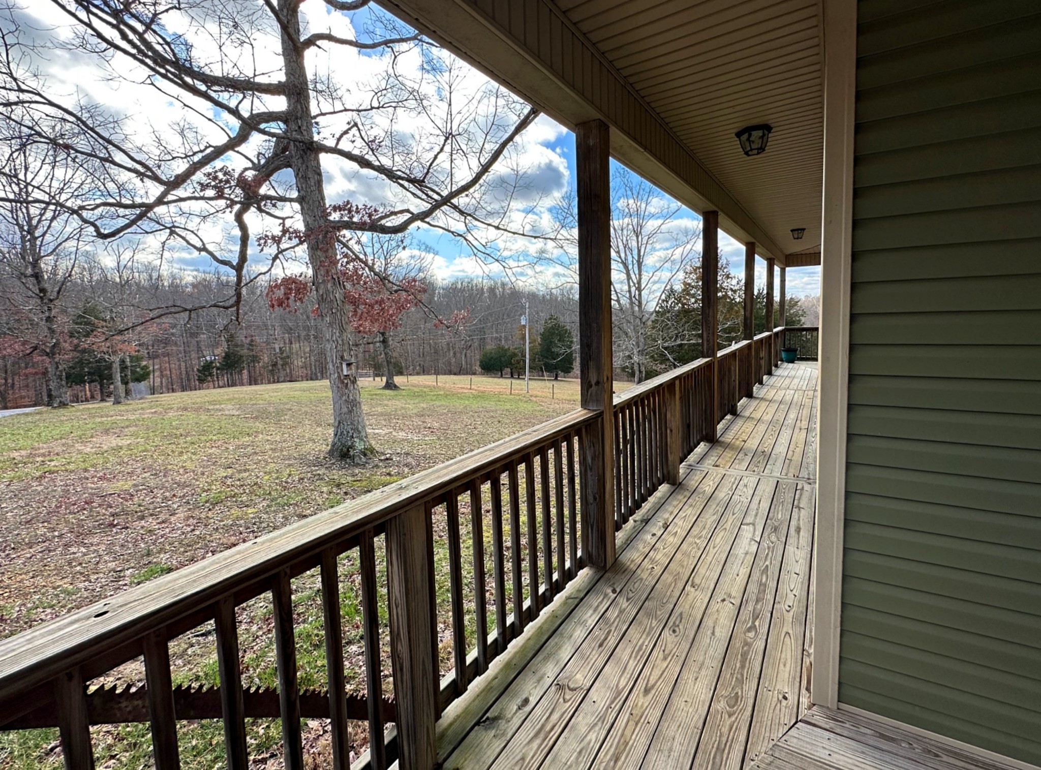 1815 Broome Road Palmyra, TN 37142 - Photo 7 of 61 a view of balcony with wooden floor