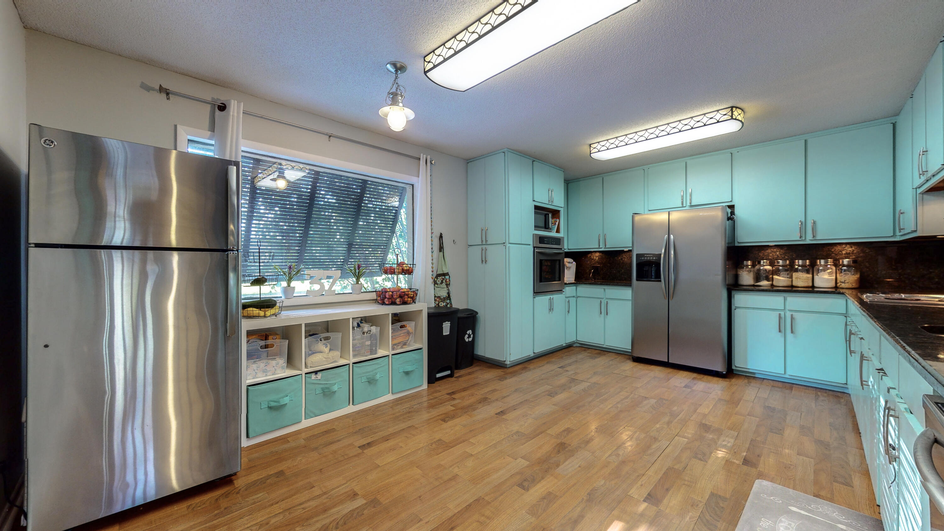 37 Country Club Road Shalimar, FL 32579 - Photo 13 of 64 a kitchen with stainless steel appliances a refrigerator and a sink