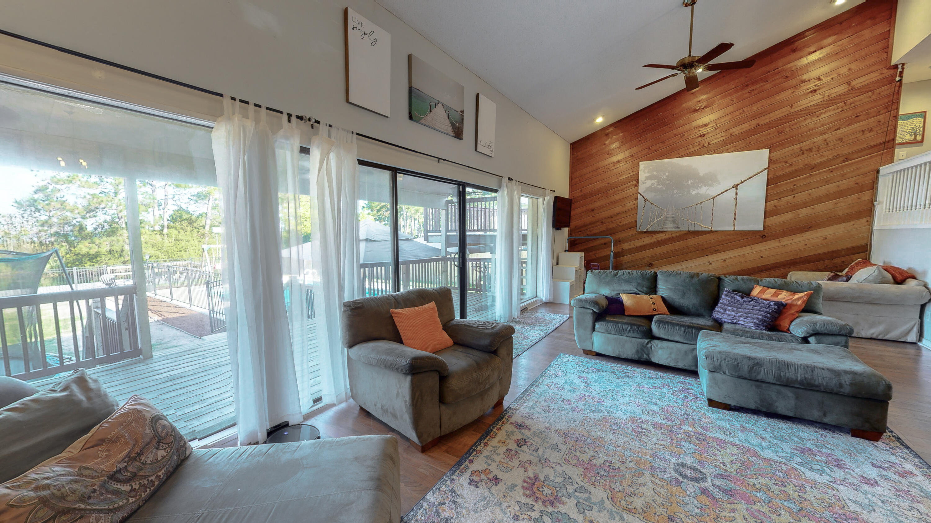 37 Country Club Road Shalimar, FL 32579 - Photo 19 of 64 a living room with furniture and a floor to ceiling window