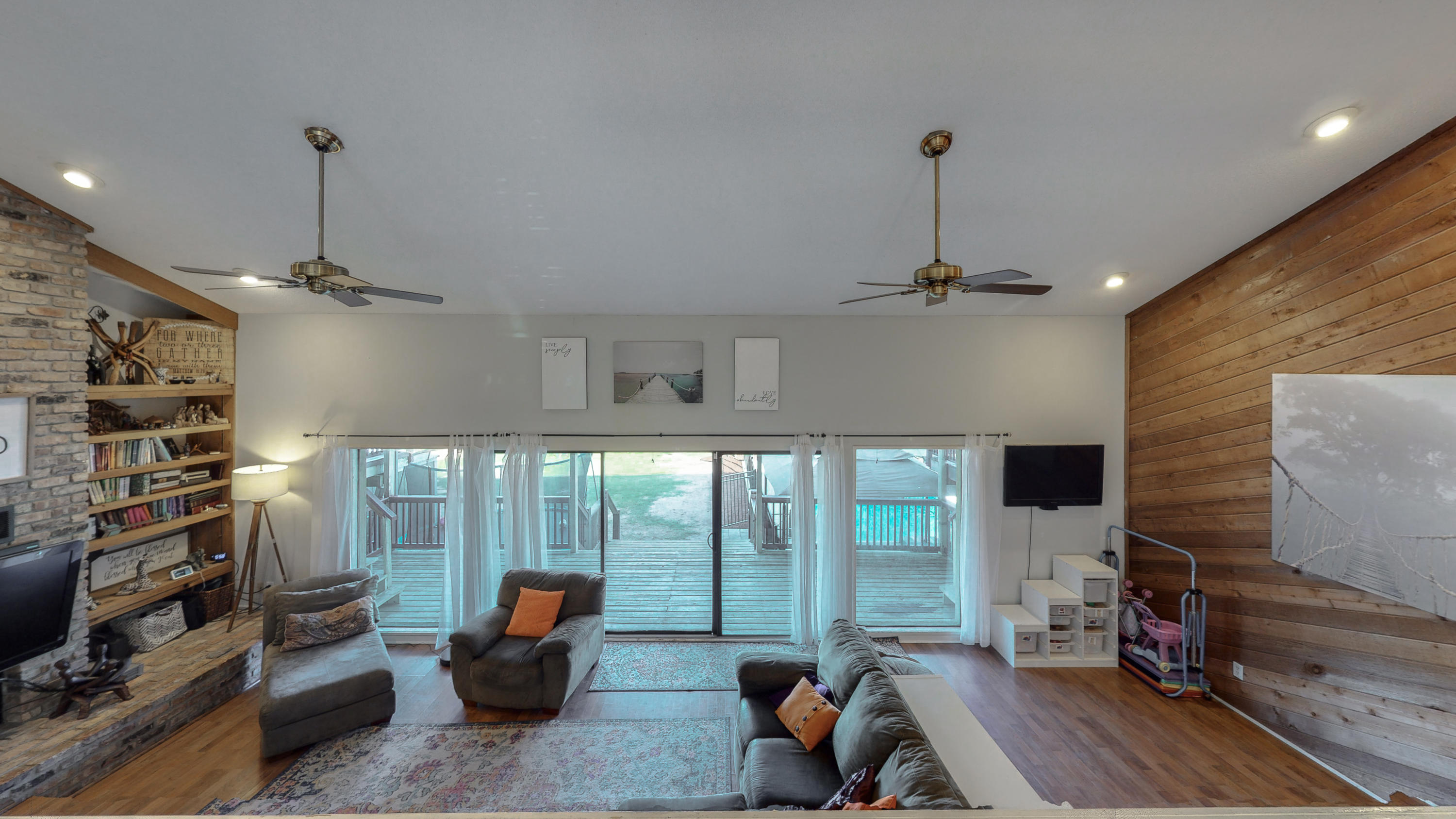 37 Country Club Road Shalimar, FL 32579 - Photo 20 of 64 a living room with furniture a window and gym equipment