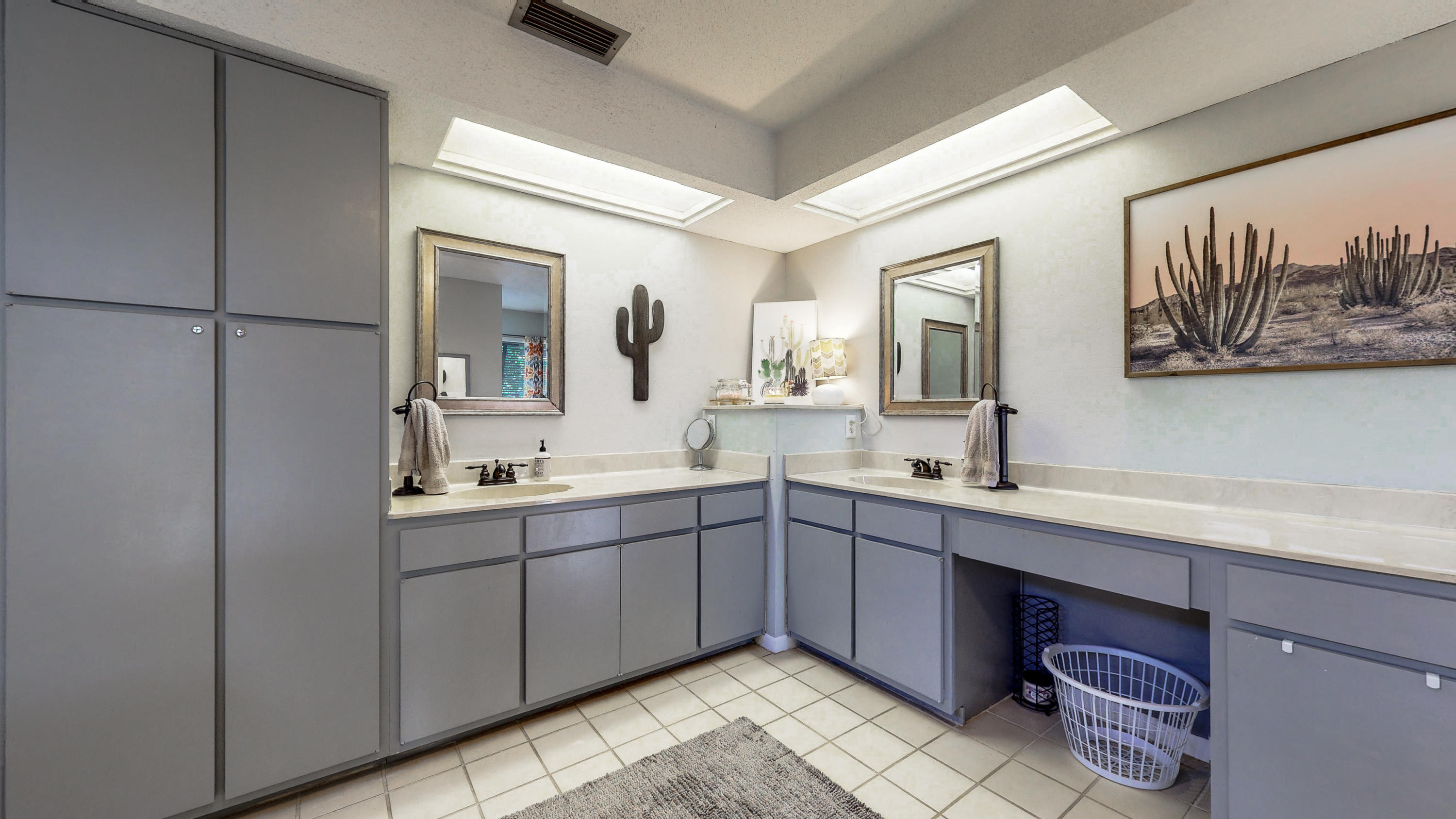 37 Country Club Road Shalimar, FL 32579 - Photo 26 of 64 a spacious bathroom with a double vanity sink and a mirror