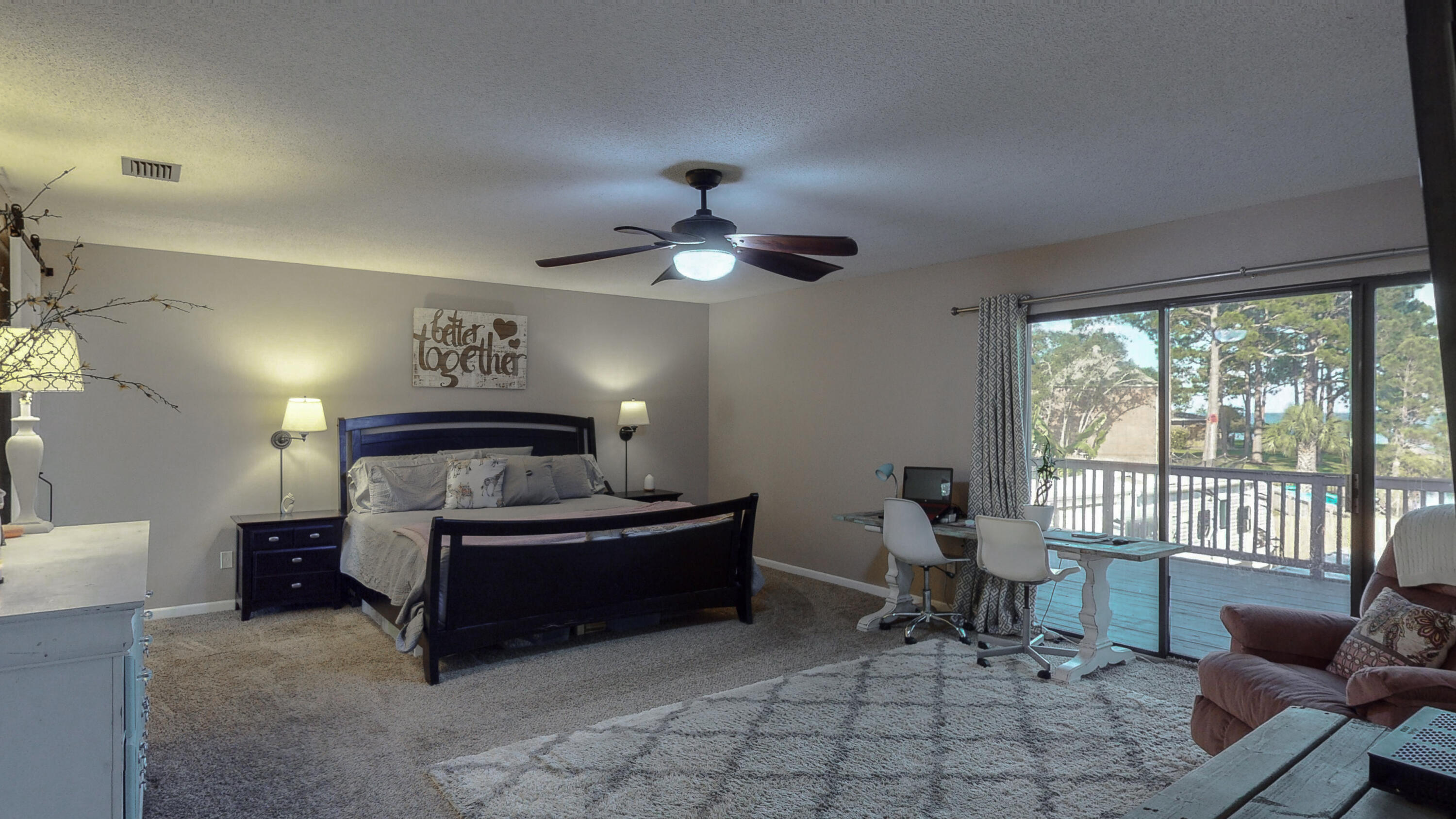 37 Country Club Road Shalimar, FL 32579 - Photo 30 of 64 a living room with furniture and a large window