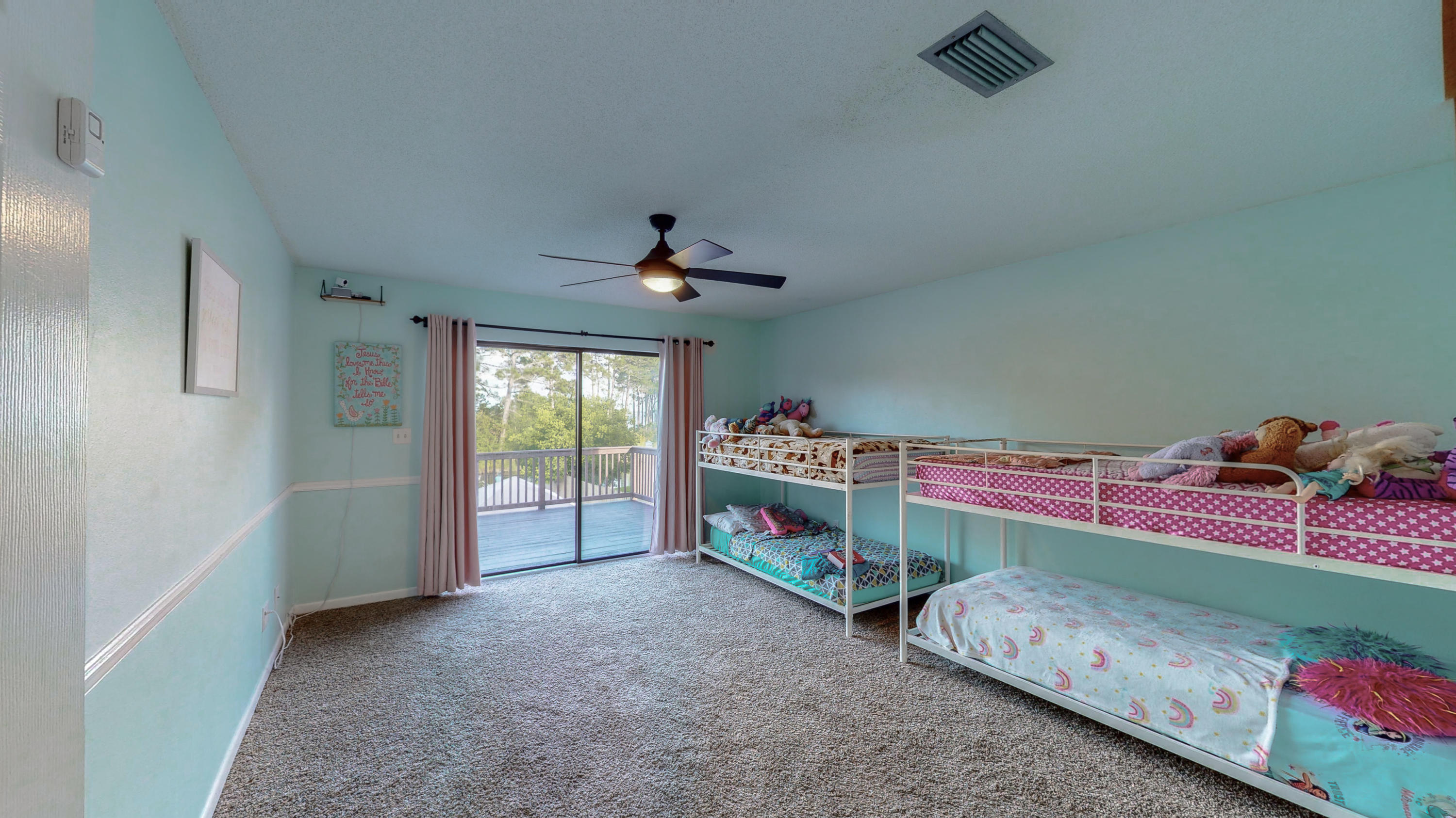37 Country Club Road Shalimar, FL 32579 - Photo 34 of 64 a bed room with a bed and a baby crib