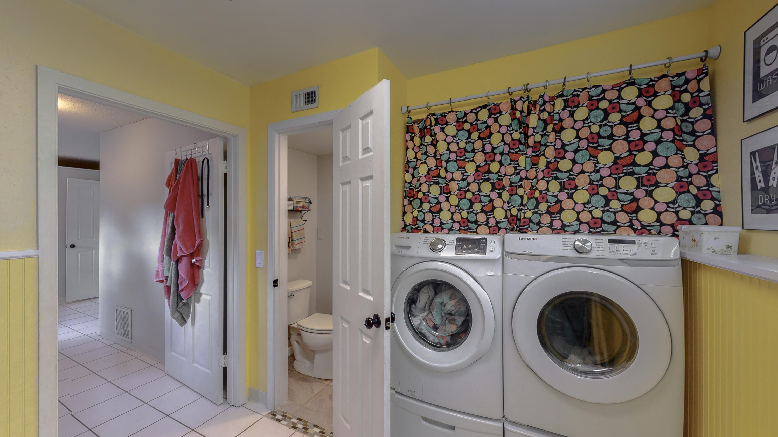37 Country Club Road Shalimar, FL 32579 - Photo 38 of 64 a view of a hallway with washer and dryer