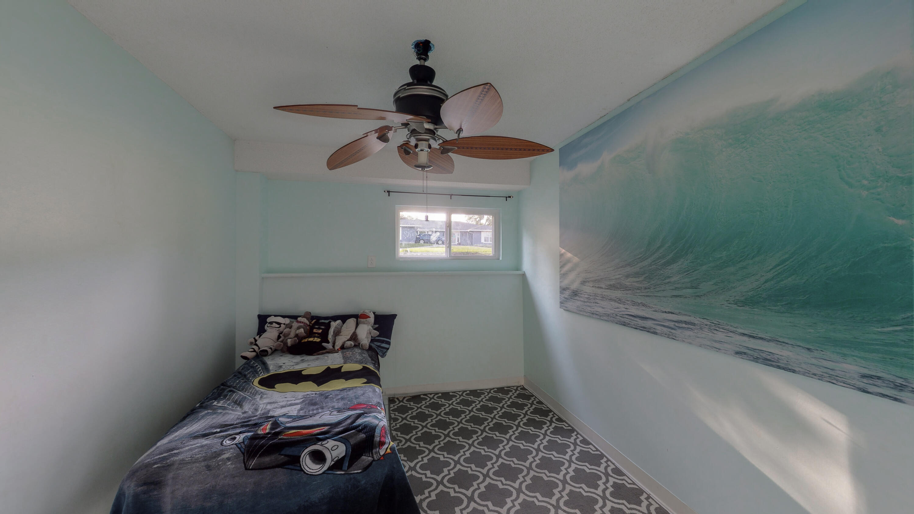37 Country Club Road Shalimar, FL 32579 - Photo 41 of 64 a bedroom with a bed and a chandelier