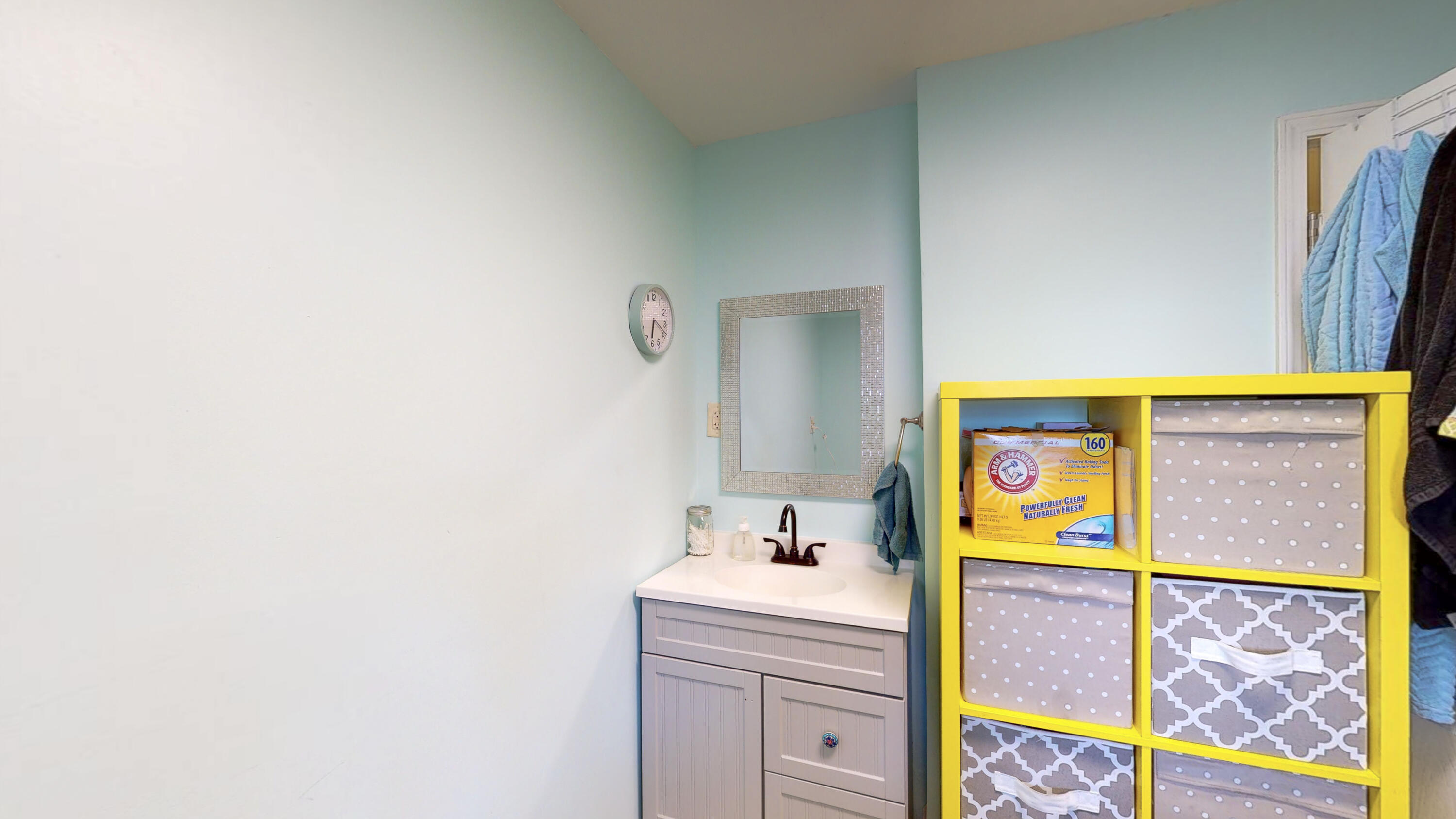 37 Country Club Road Shalimar, FL 32579 - Photo 46 of 64 a bathroom with a sink and a mirror