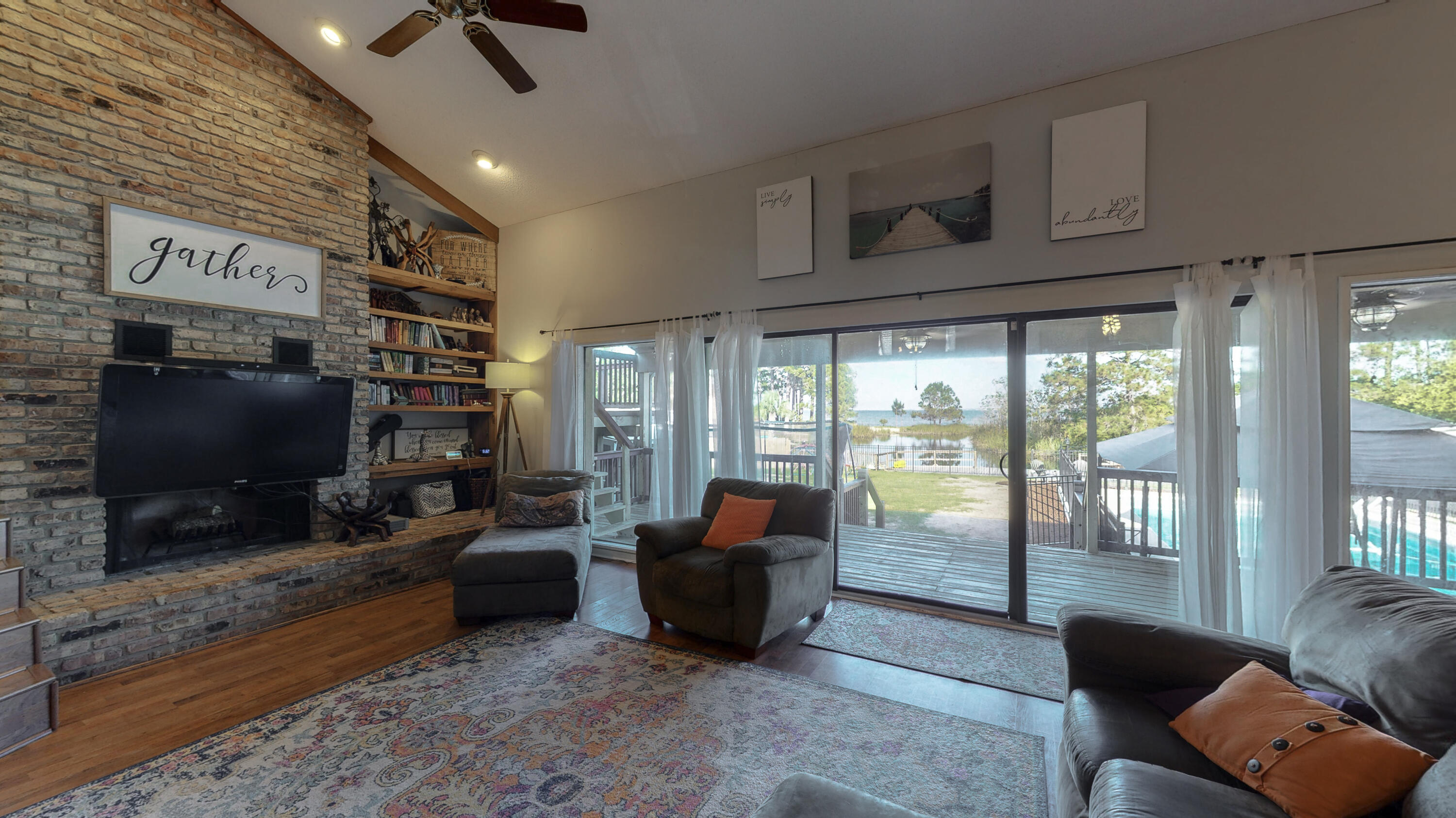 37 Country Club Road Shalimar, FL 32579 - Photo 5 of 64 a living room with furniture and a flat screen tv