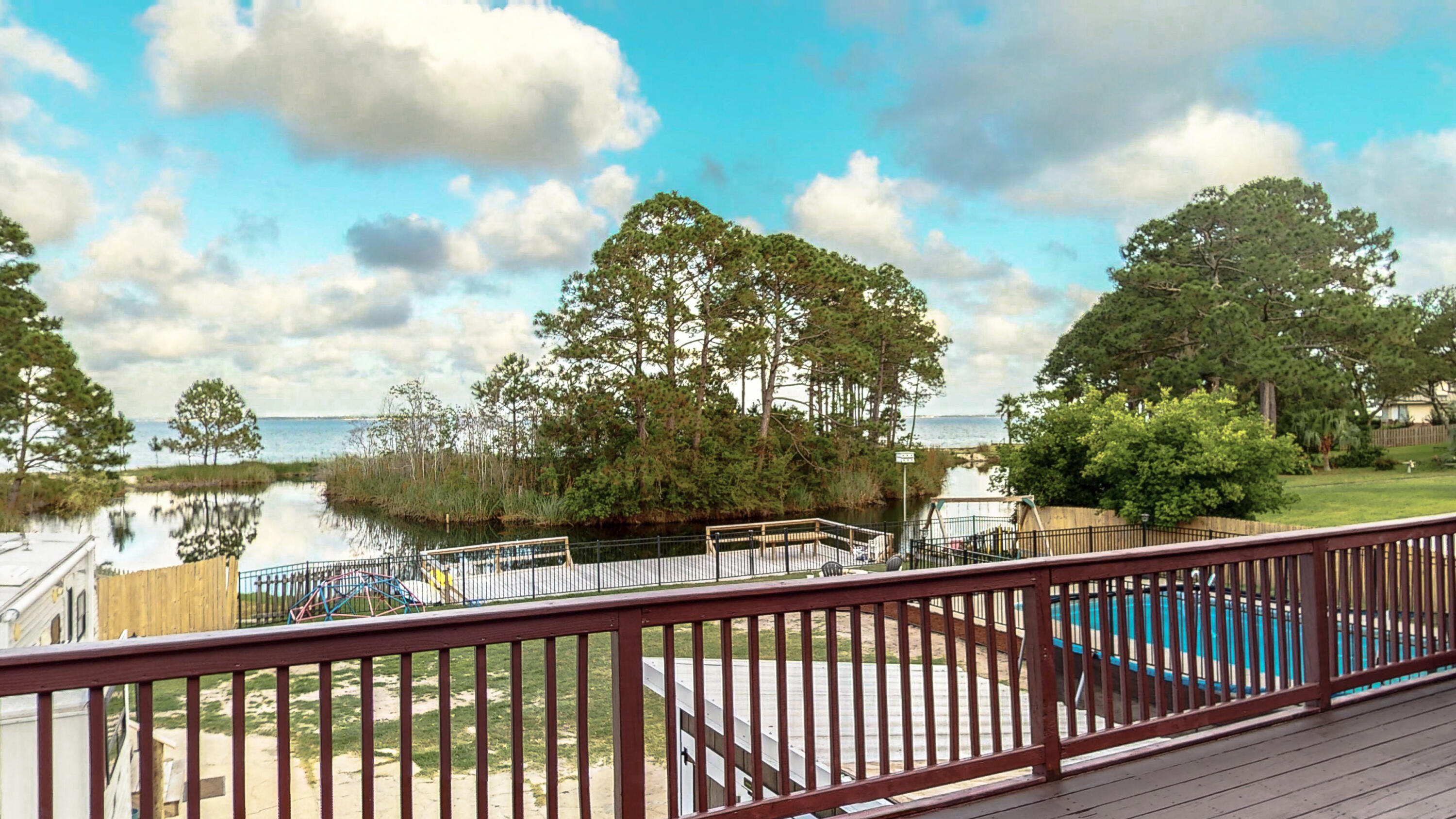 37 Country Club Road Shalimar, FL 32579 - Photo 56 of 64 a view of a balcony with lake