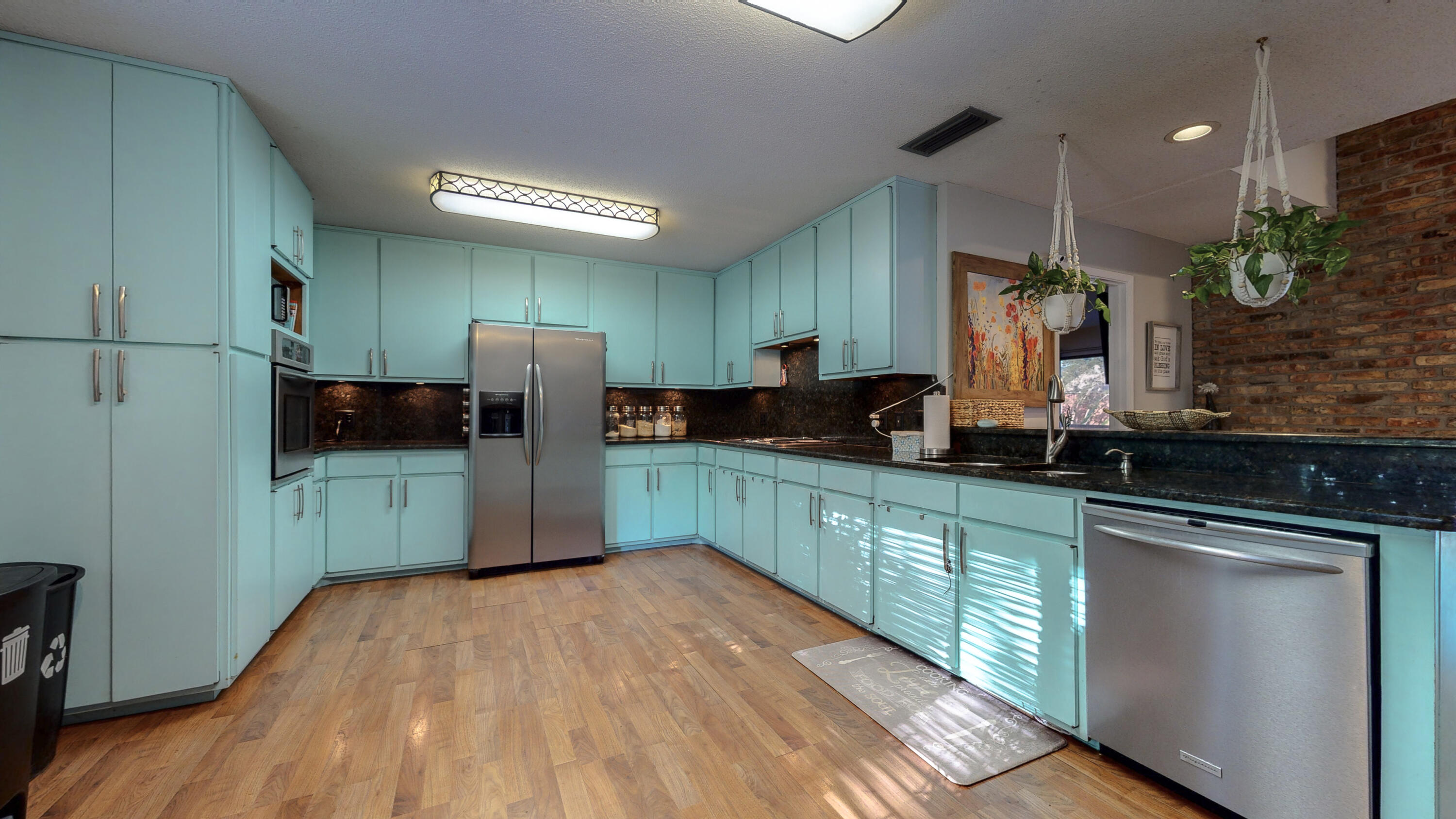 37 Country Club Road Shalimar, FL 32579 - Photo 7 of 64 a kitchen with a sink and a refrigerator