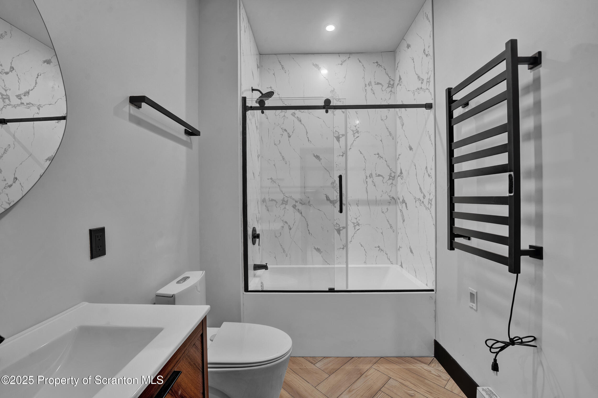 115 Penn Avenue, Unit 202 Scranton, PA 18503 - Photo 17 of 60 a bathroom with a shower toilet and sink