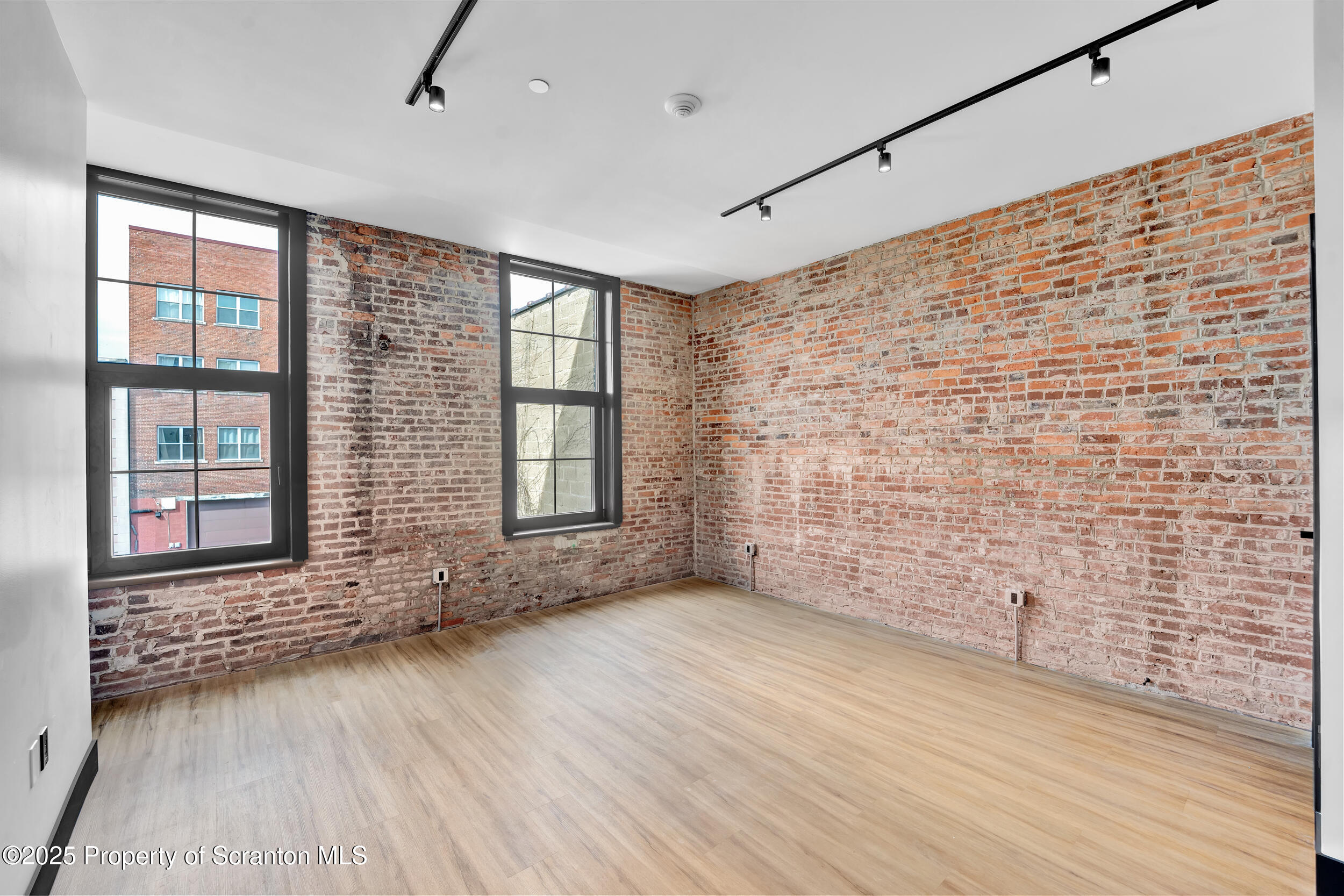 115 Penn Avenue, Unit 202 Scranton, PA 18503 - Photo 34 of 60 a view of an empty room with a window