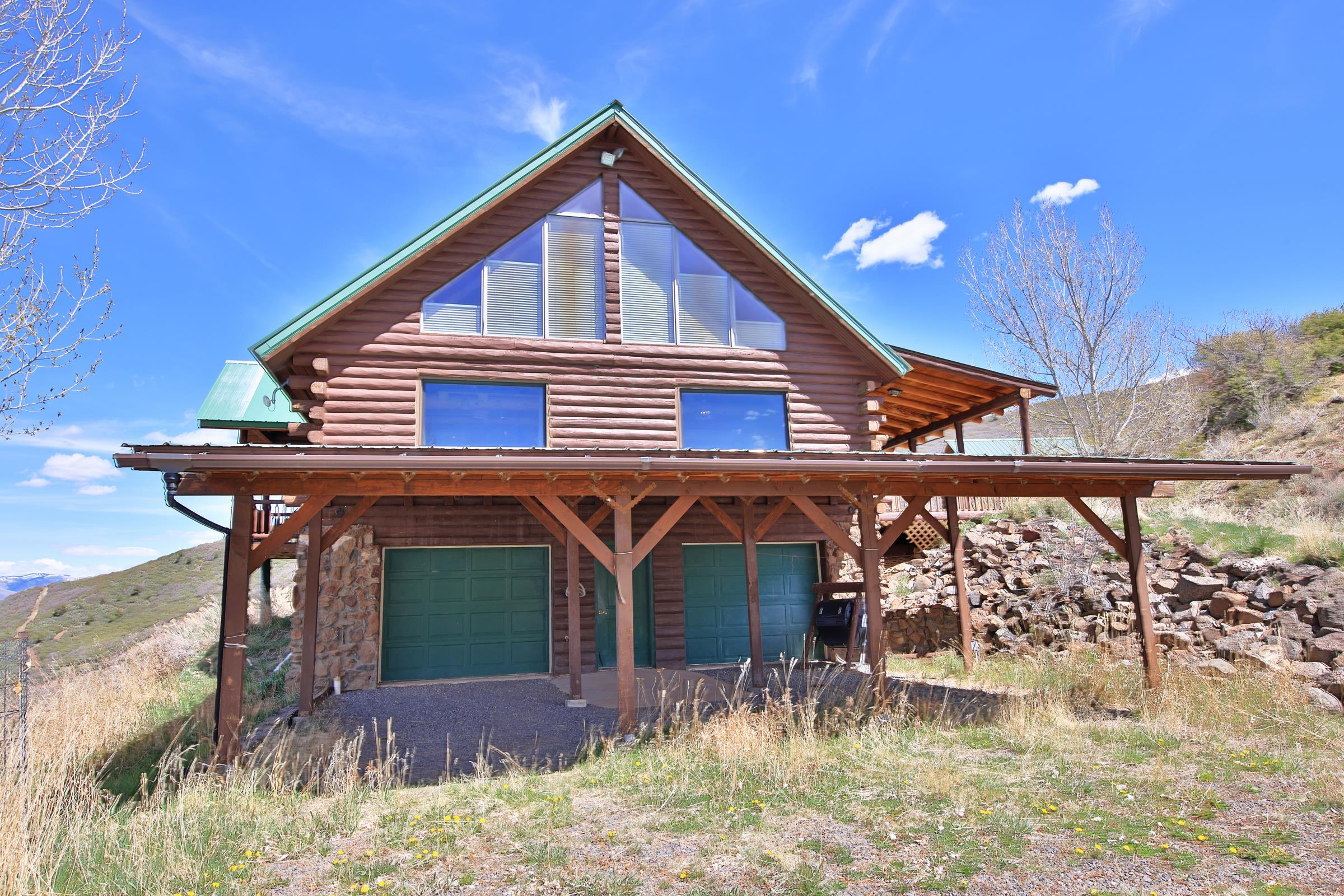 10822-60 60 75/100 Road Collbran, CO 81624 - Photo 31 of 42 a view of house with a yard