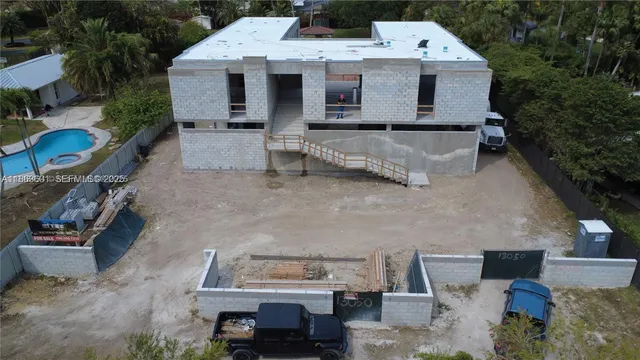 an aerial view of a house with a garden