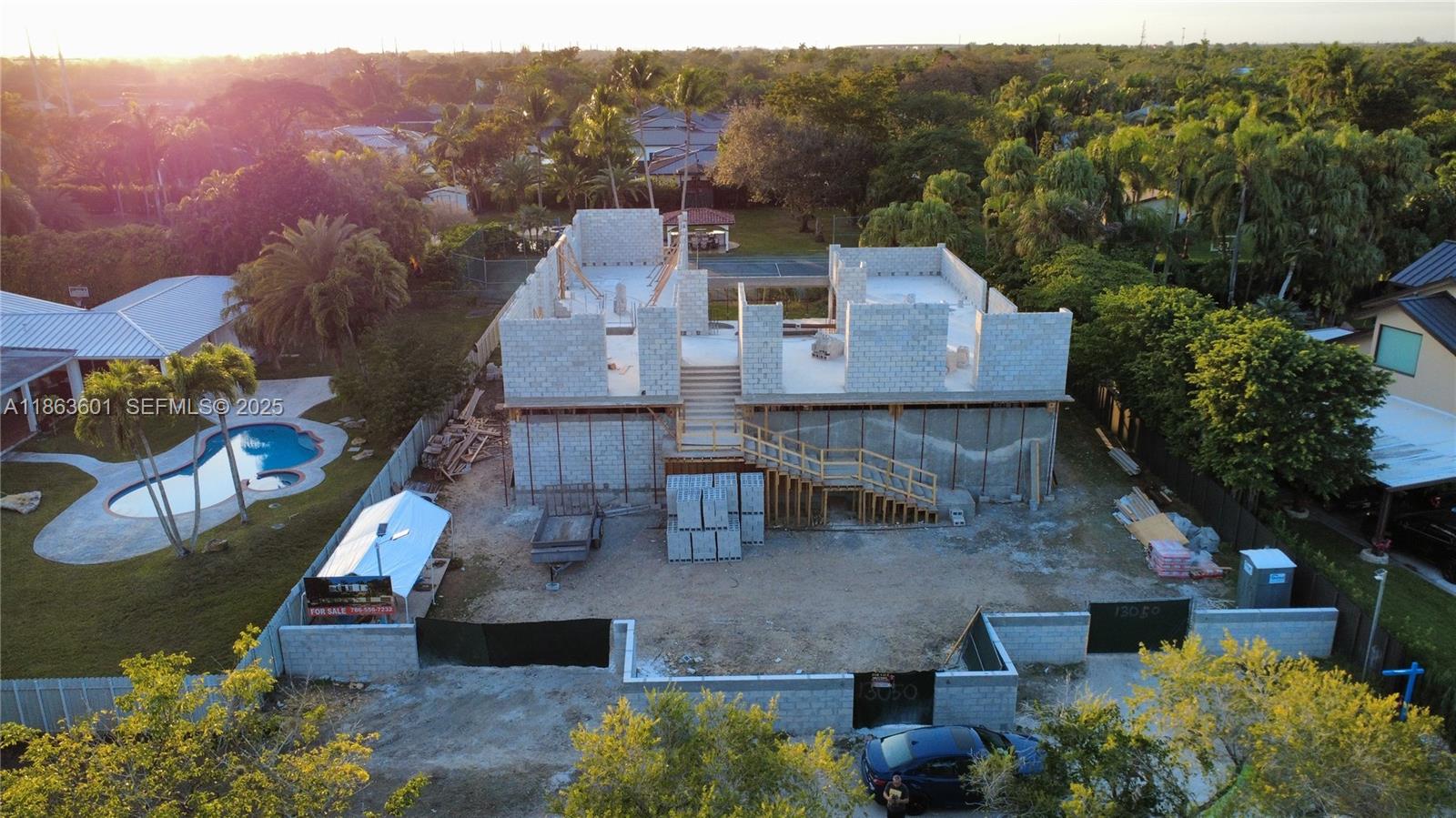 13050 Southwest 103rd Avenue Miami, FL 33176 - Photo 12 of 37 an aerial view of a house with a garden