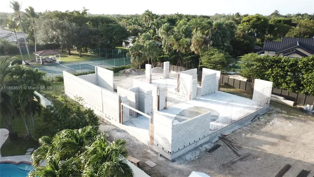 a view of a wrought iron fences in front of house
