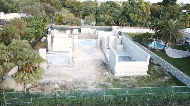 swimming pool view with a outdoor seating space