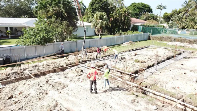 a view of a swimming pool with a garden