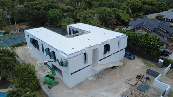 an aerial view of a house with garden