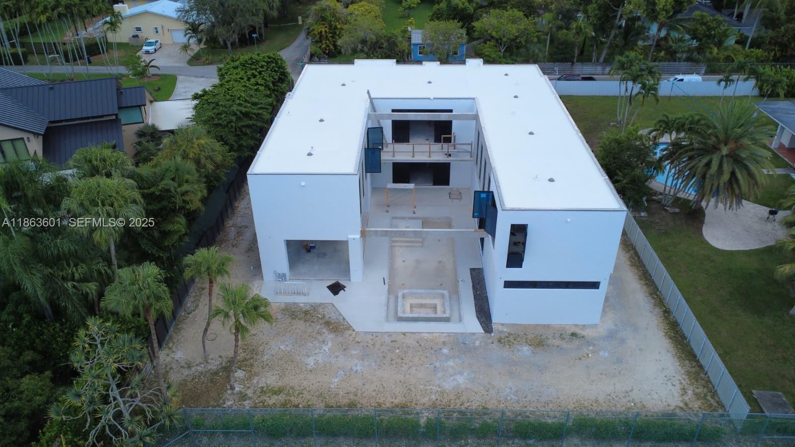 13050 Southwest 103rd Avenue Miami, FL 33176 - Photo 4 of 37 an aerial view of a house with garden