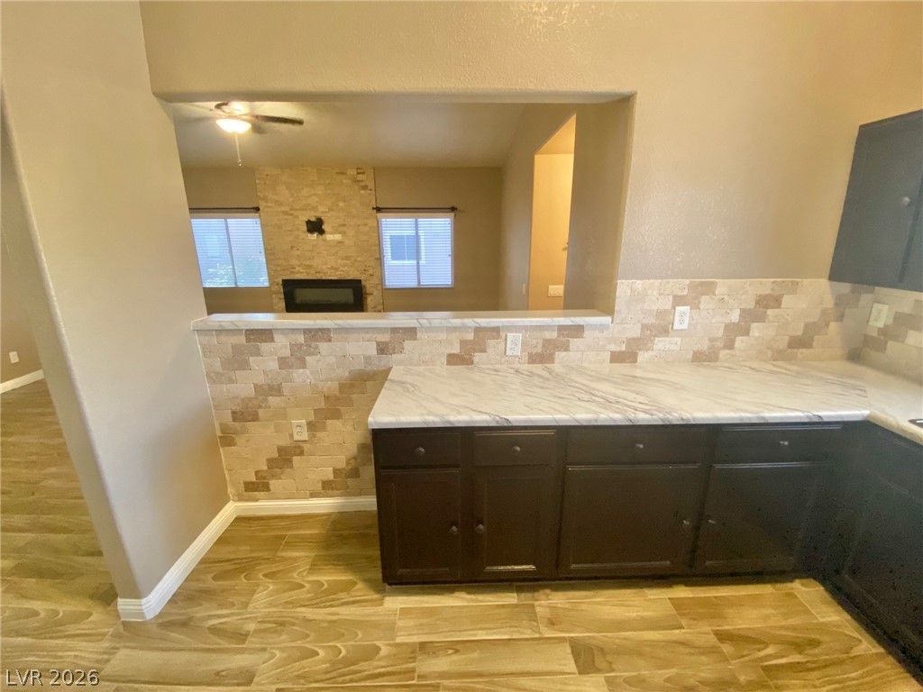 2000 Turquoise Ridge Street, Unit 204 Las Vegas, NV 89117 - Photo 16 of 29 A well-appointed kitchen features ample counter space, rich cabinetry, and easy access to the living area.