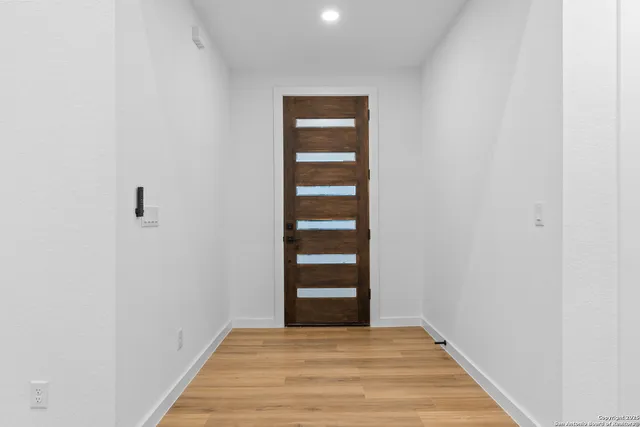 a view of a hallway with closet