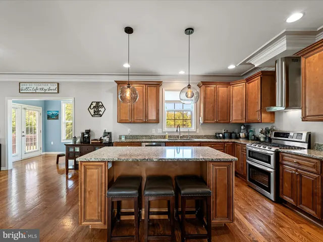 a living room with a fireplace and a flat screen tv