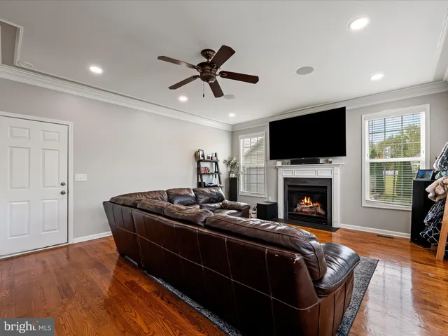 a spacious bedroom with a large bed and a window