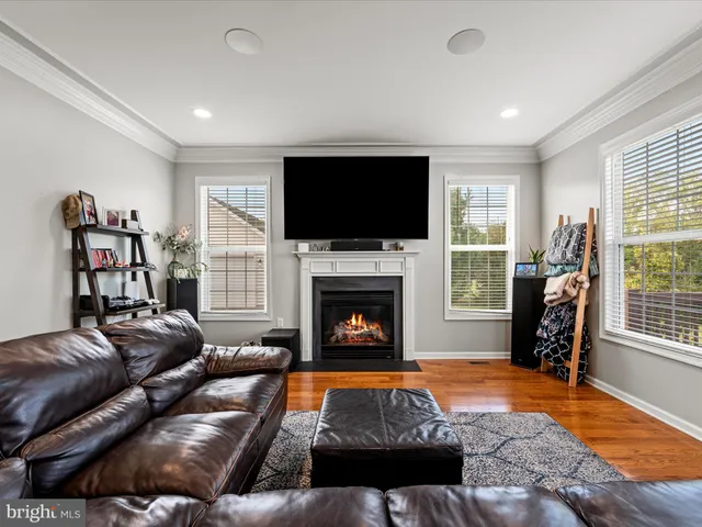 a bed room with a bed and a chandelier