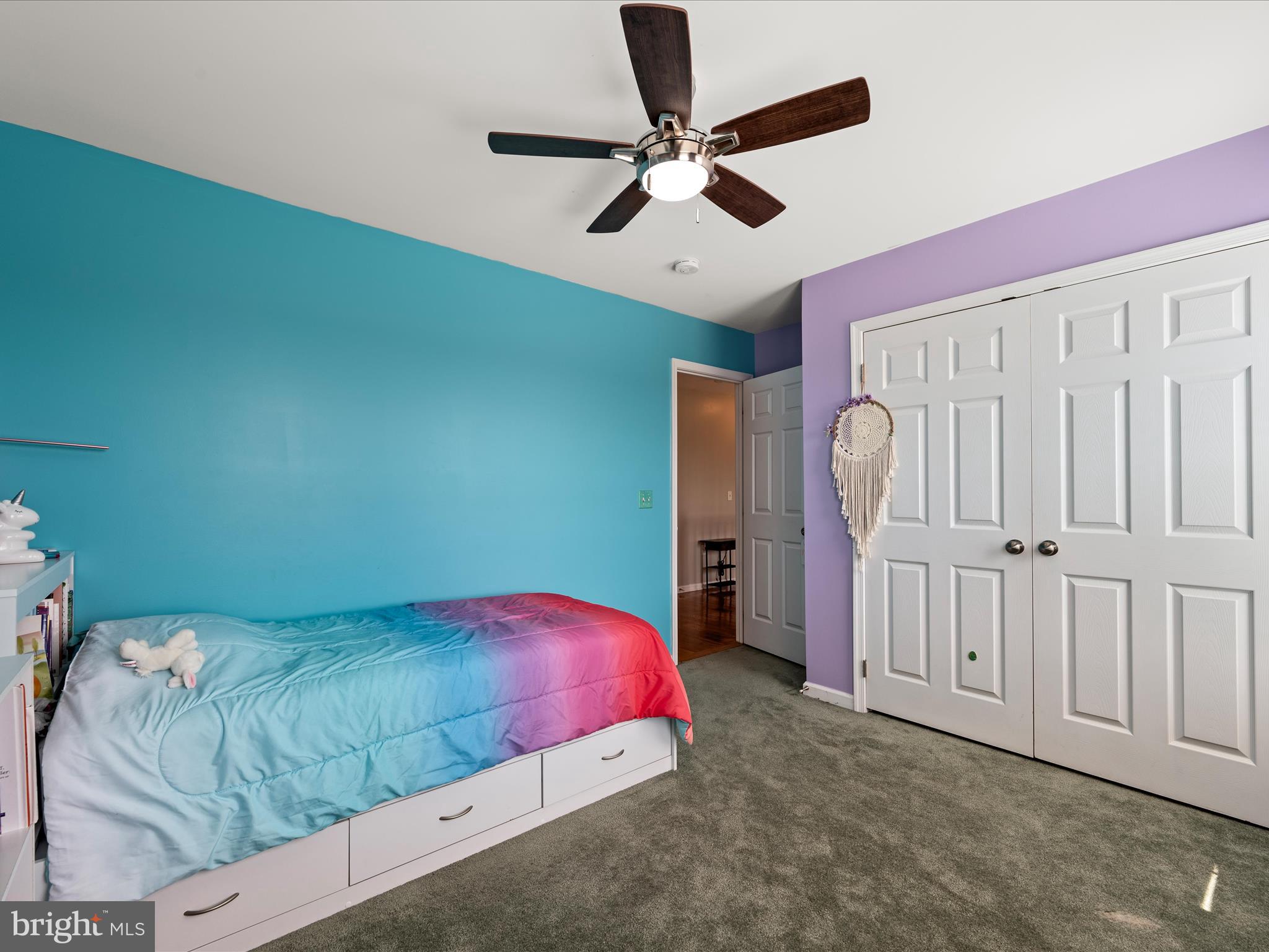 80 Varick Trail Hedgesville, WV 25427 - Photo 45 of 80 a bedroom with a bed and a chandelier