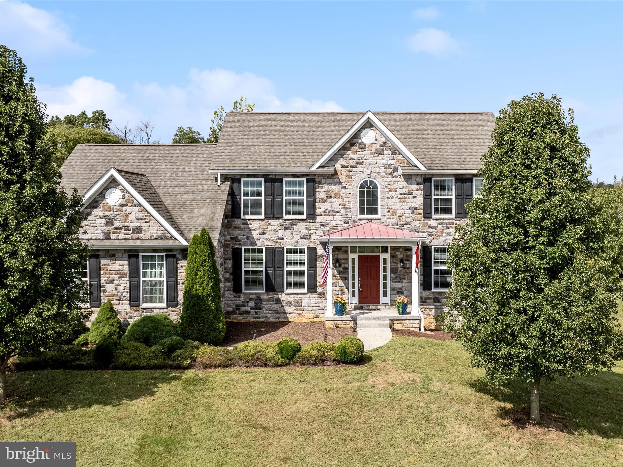 80 Varick Trail Hedgesville, WV 25427 - Photo 64 of 80 a view of a white house with a yard and plants
