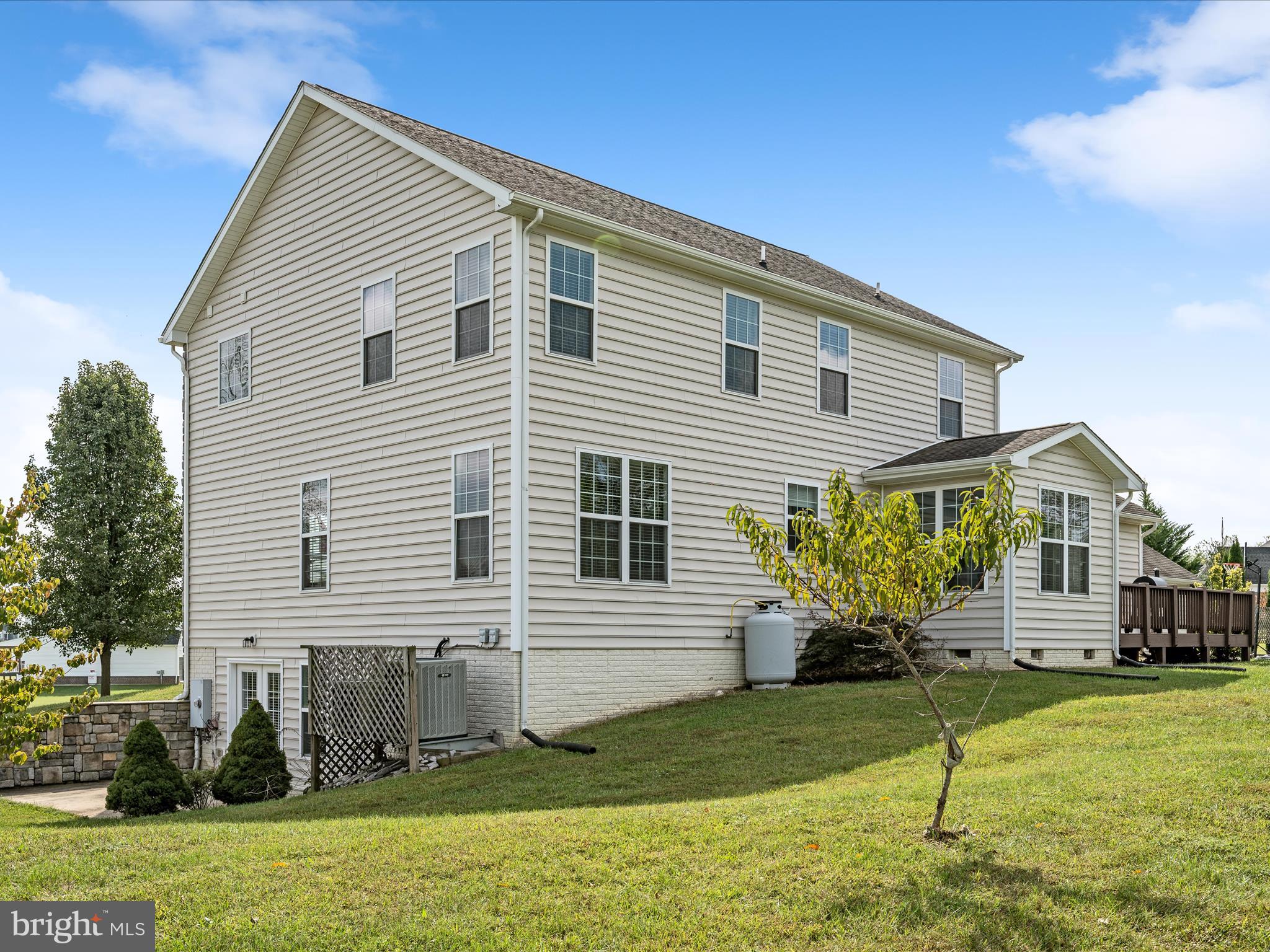 80 Varick Trail Hedgesville, WV 25427 - Photo 70 of 80 a front view of a house with a yard