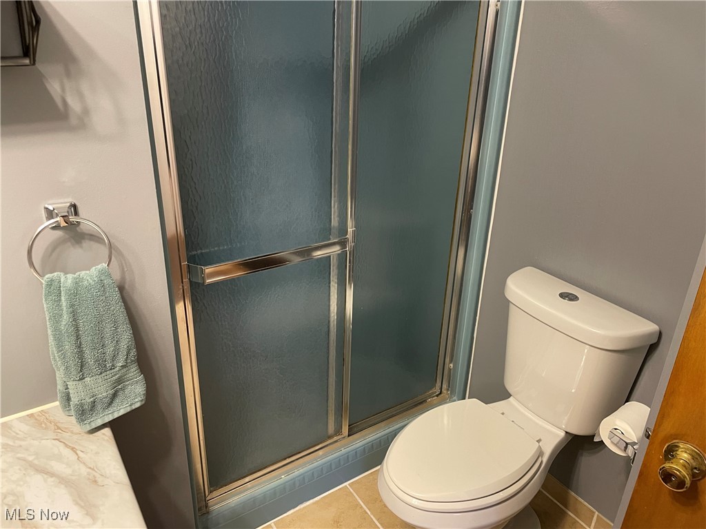 1381 Robb Road Conneaut, OH 44030 - Photo 28 of 50 Full bath featuring a stall shower and tile patterned floors