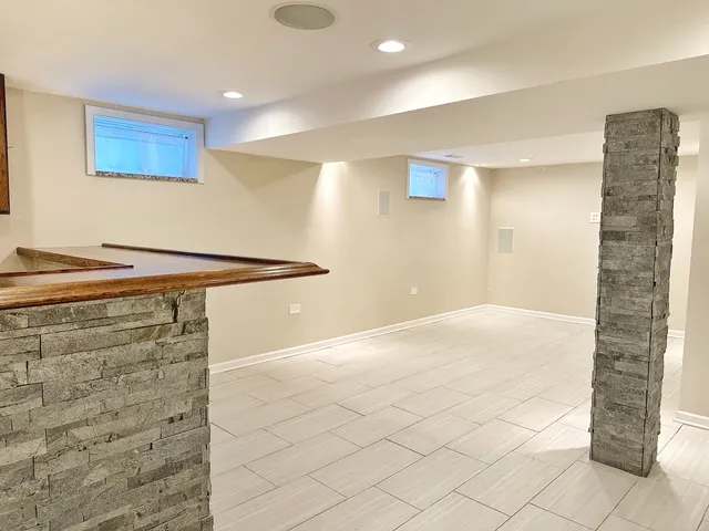 a bathroom with a sink and mirror