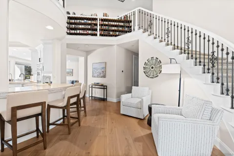 a view of a living room and entry way