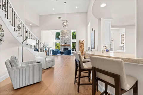 a spacious bathroom with a double vanity sink toilet and a mirror