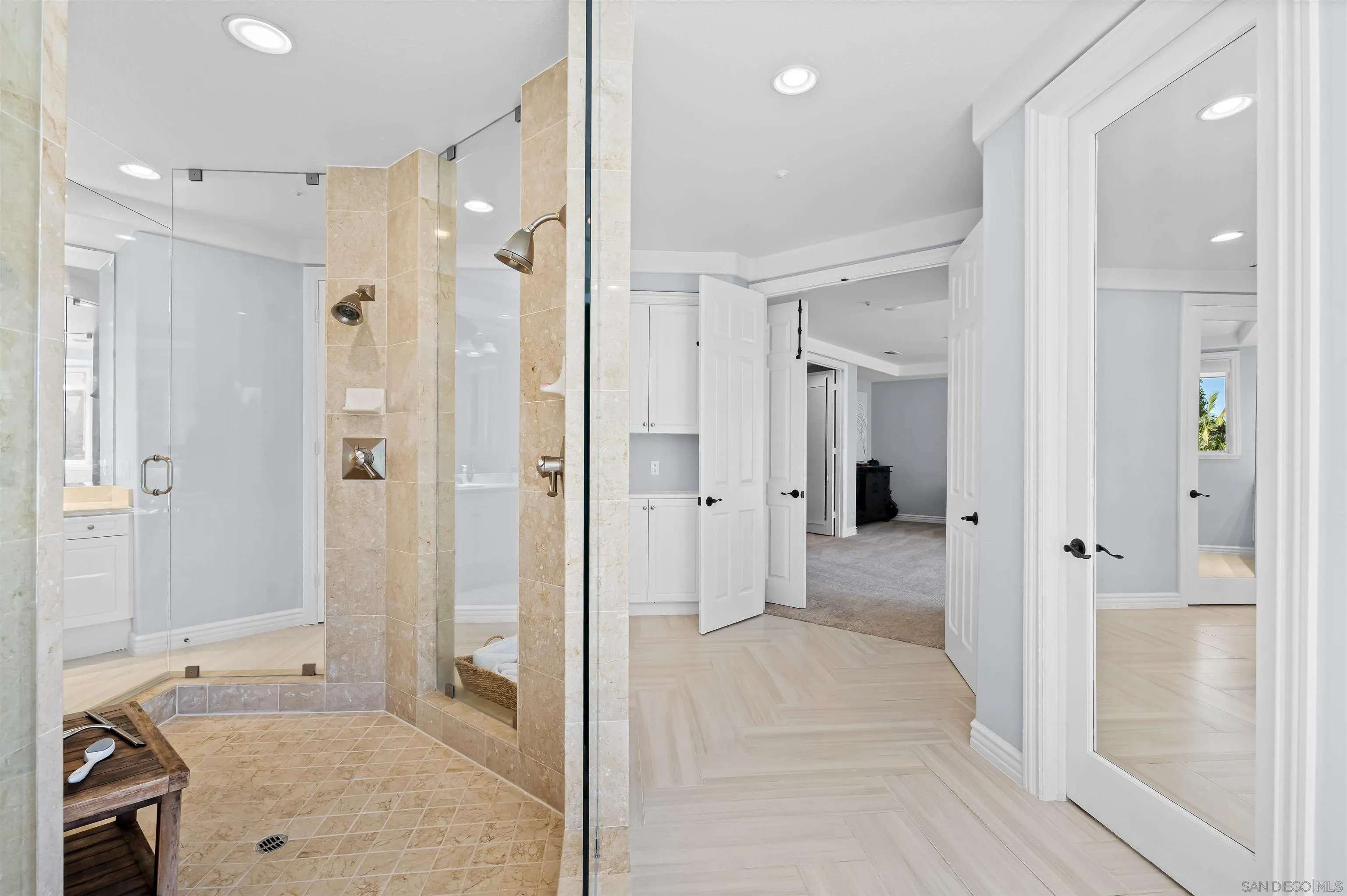 301 Cantle Lane Encinitas, CA 92024 - Photo 37 of 75 a bathroom with a shower and a glass door