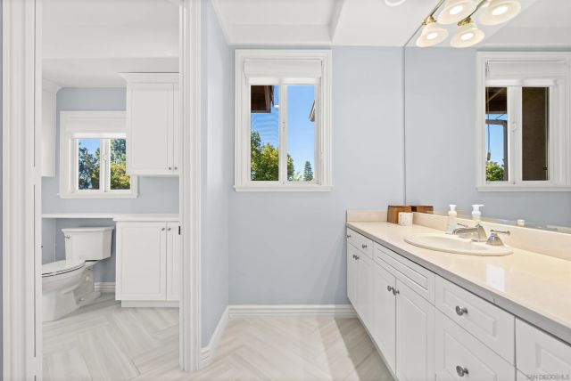 a view of a backyard with sitting area