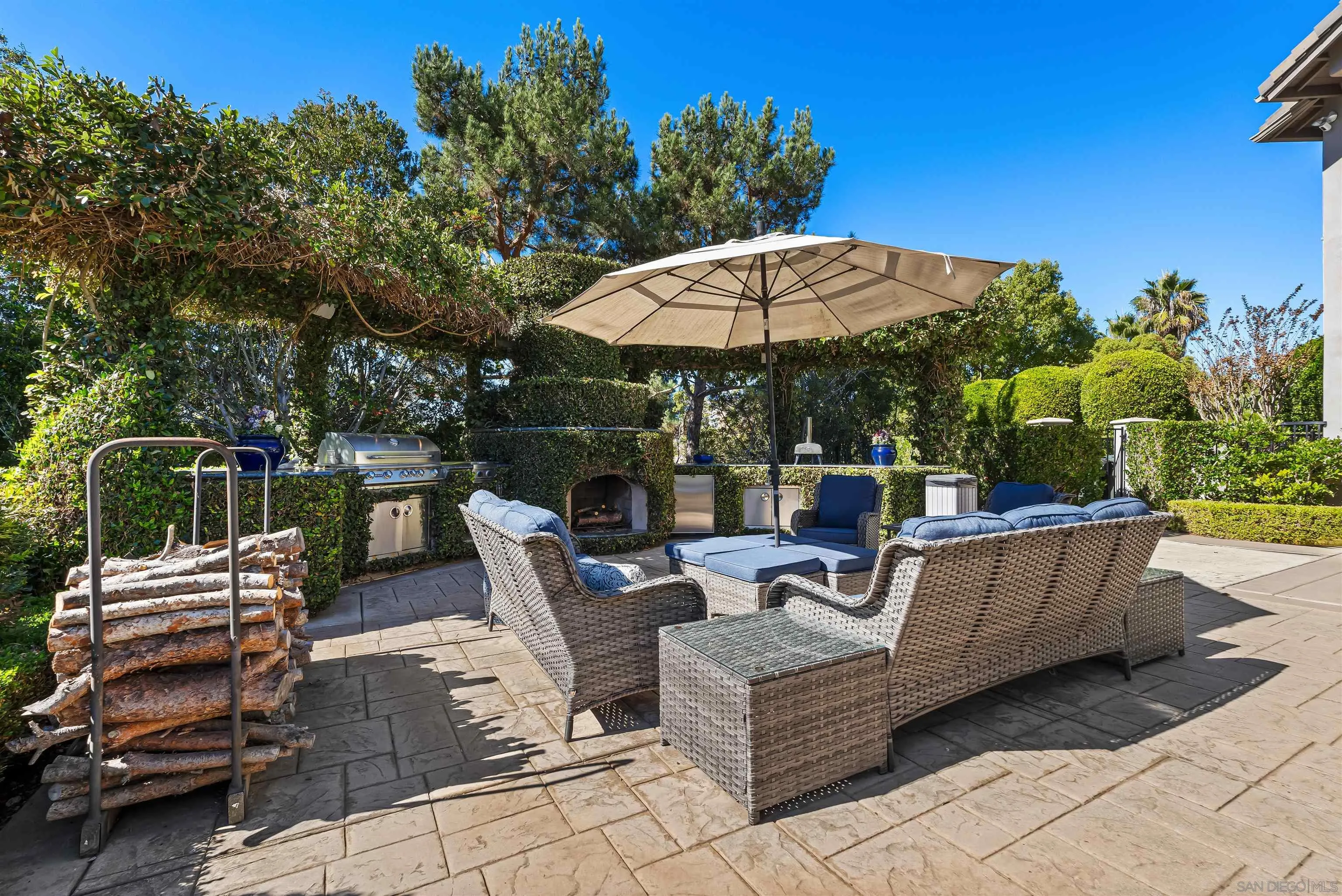 301 Cantle Lane Encinitas, CA 92024 - Photo 42 of 75 an outdoor sitting area with furniture and garden view