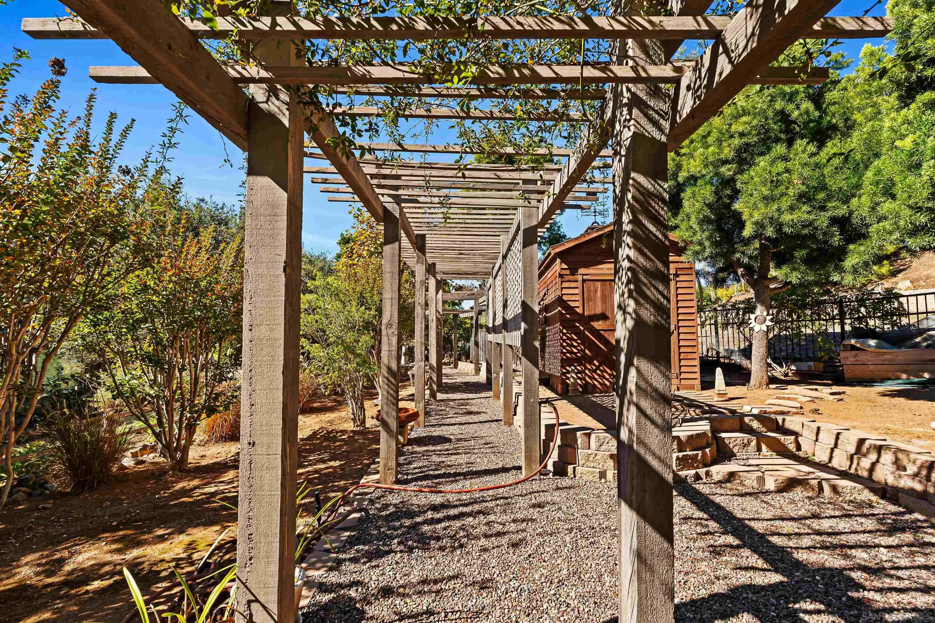 301 Cantle Lane Encinitas, CA 92024 - Photo 55 of 75 a front view of a house with a tree