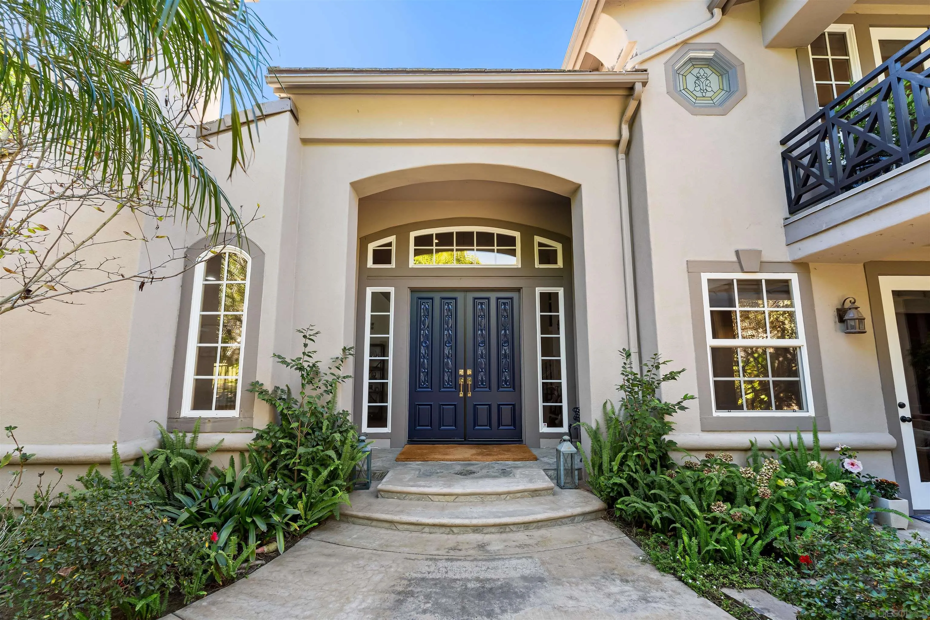 301 Cantle Lane Encinitas, CA 92024 - Photo 6 of 75 a front view of a house with a porch