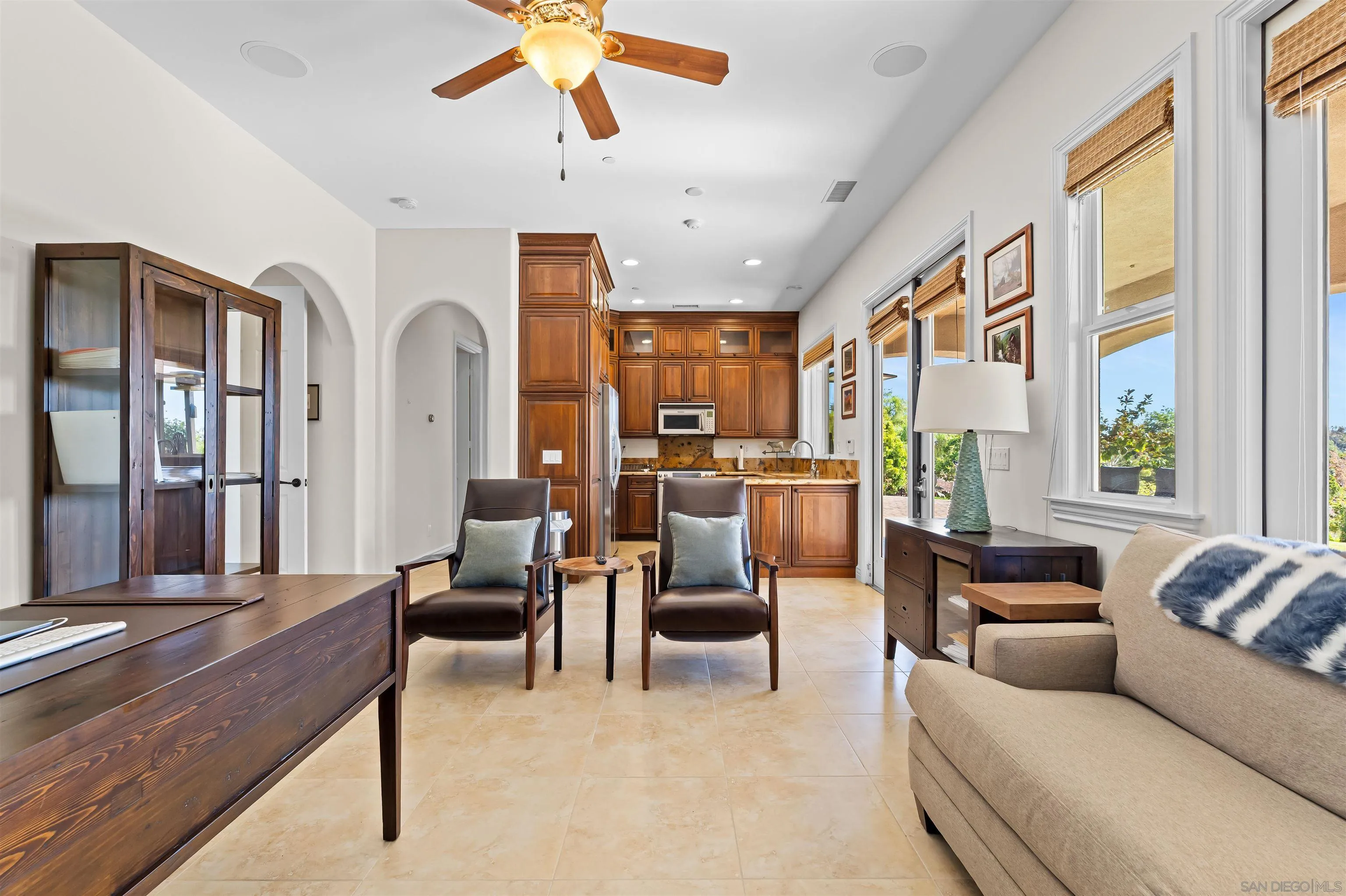 301 Cantle Lane Encinitas, CA 92024 - Photo 64 of 75 a living room with furniture and a large window