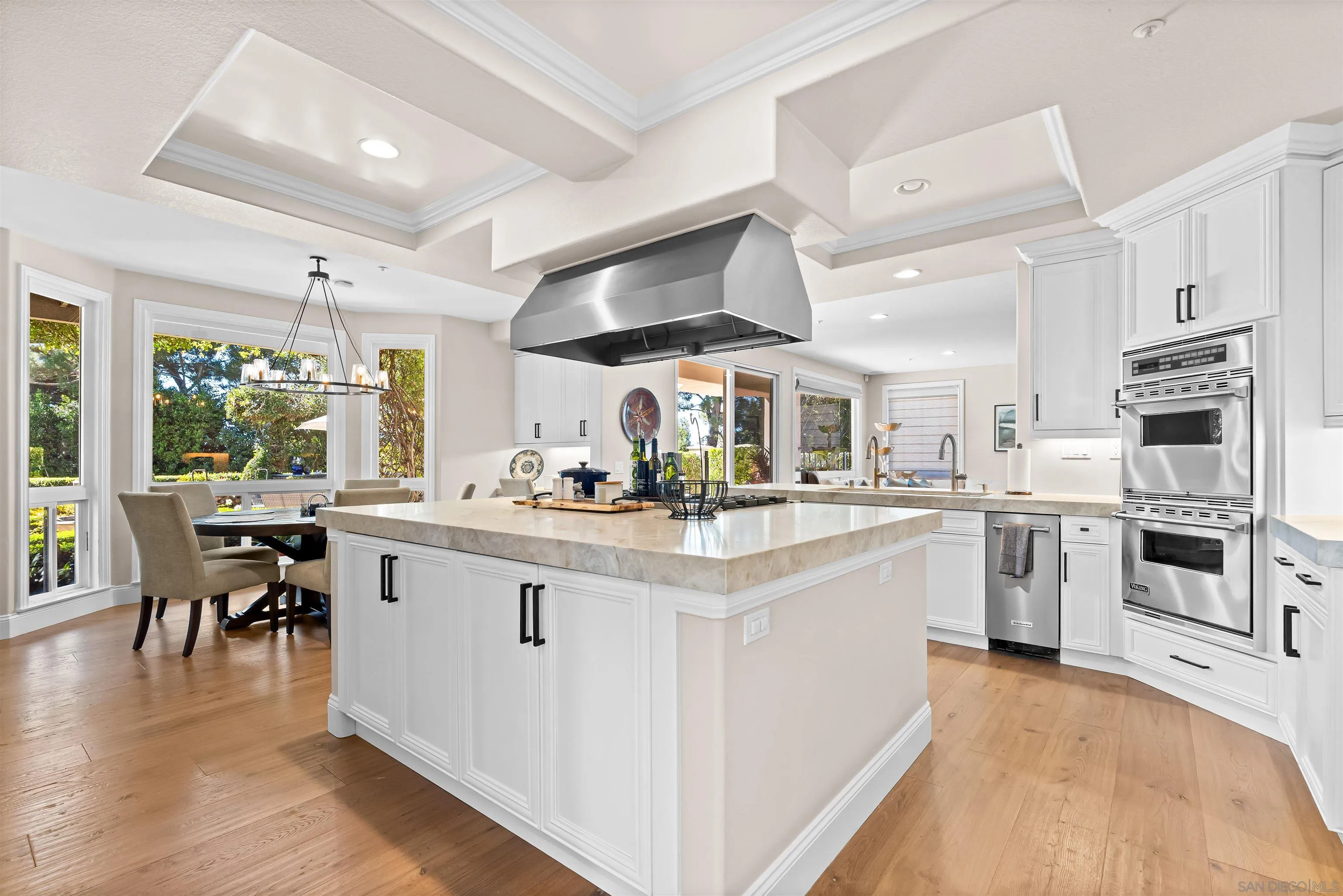 301 Cantle Lane Encinitas, CA 92024 - Photo 7 of 75 a kitchen with stainless steel appliances granite countertop a stove and a refrigerator
