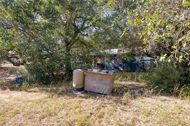 a view of outdoor space and yard